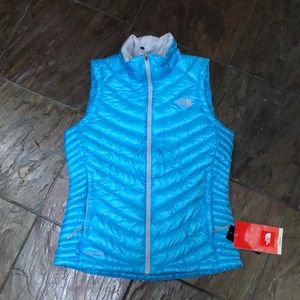 The North Face turquoise small vest new with tags